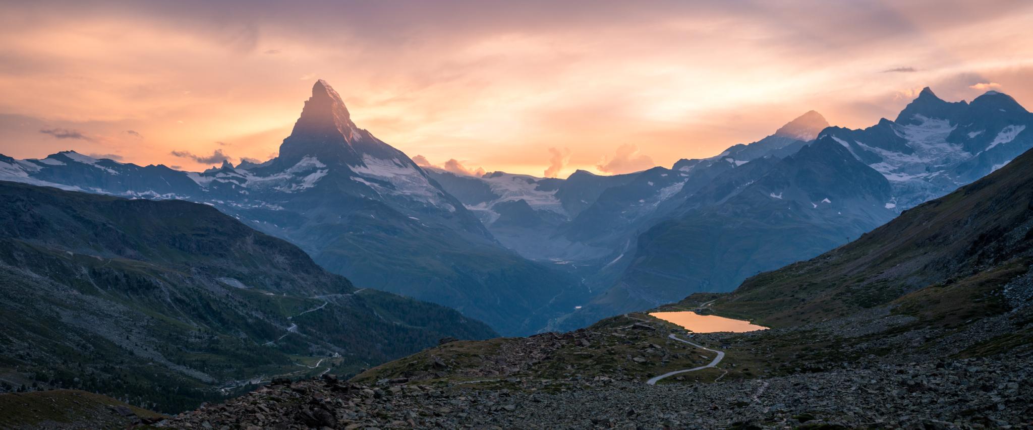 Landscape photograph of Swiss Alps with Matterhorn and Stellisee at sunset, Switzerland. Buy a canvas, framed or acrylic fine art print.