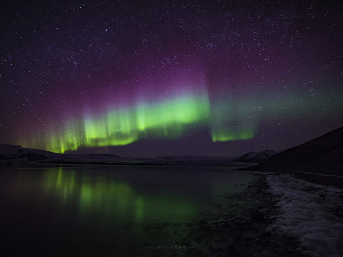 Photo of Northern Lights over Jökulsárlón, Iceland. Buy a canvas, framed or acrylic fine art print.