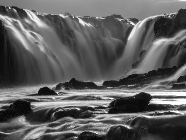 Waterfall in Iceland. Buy a canvas, framed or acrylic fine art print.