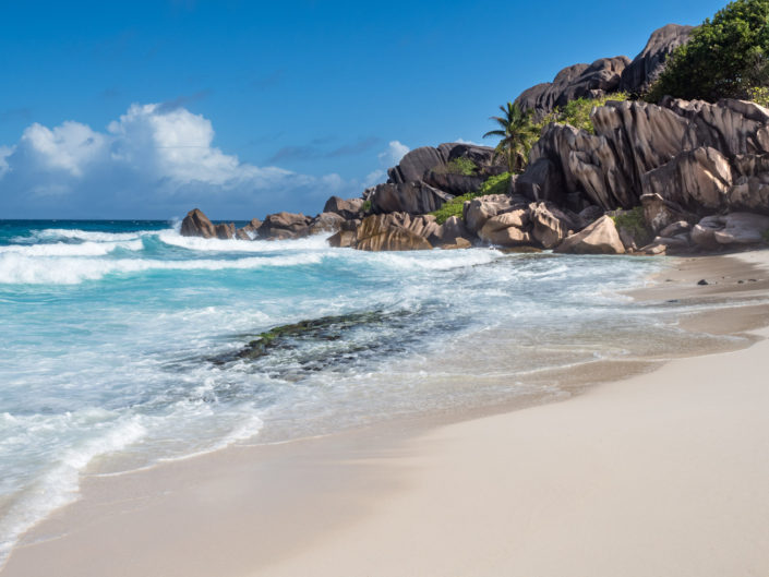 Sunny day on a beach in Seychelles. Buy a canvas, framed or acrylic fine art print.