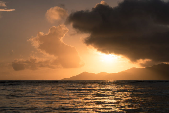 Photo of a beautiful sunset on Seychelles. Buy a canvas, framed or acrylic fine art print.