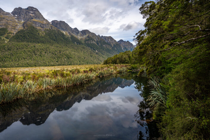 Image of a lake, forest and mountains in New Zealand. Buy a canvas, framed or acrylic fine art print.