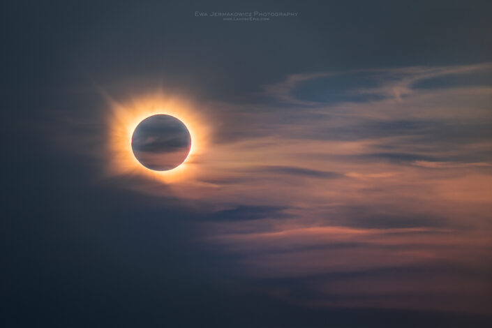 Totality - Solar Eclipse 2026 with beautiful clouds at sunset