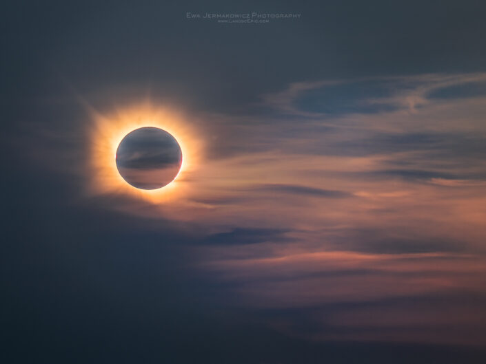 Totality - Solar Eclipse 2026 with beautiful clouds at sunset